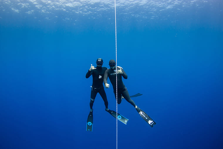 two divers underwater