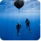 two divers under water